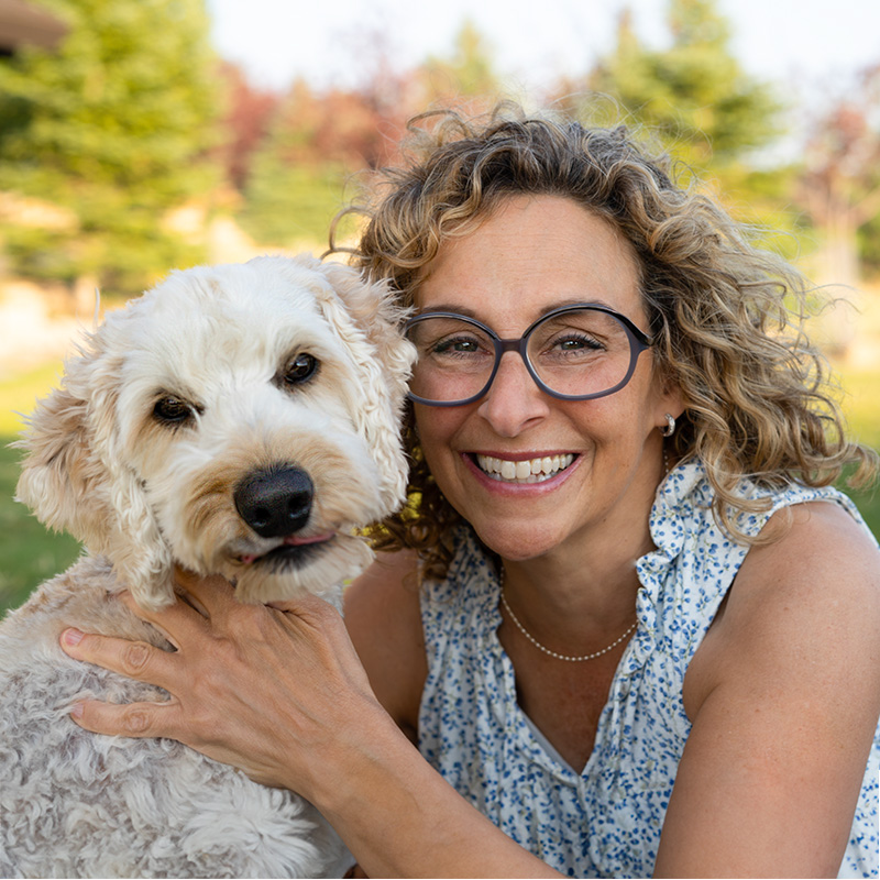 Jodi Lerner, LCSW with dog; online discernment counselor, NY therapist