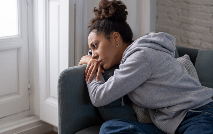 Woman feeling depressed after childhood emotional neglect