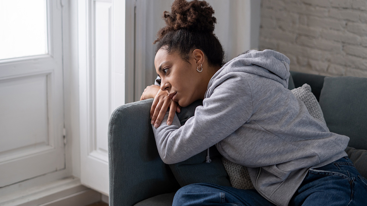 Woman feeling depressed after childhood emotional neglect